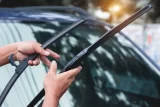 Beau's - Hands Holding Windshield Wiper